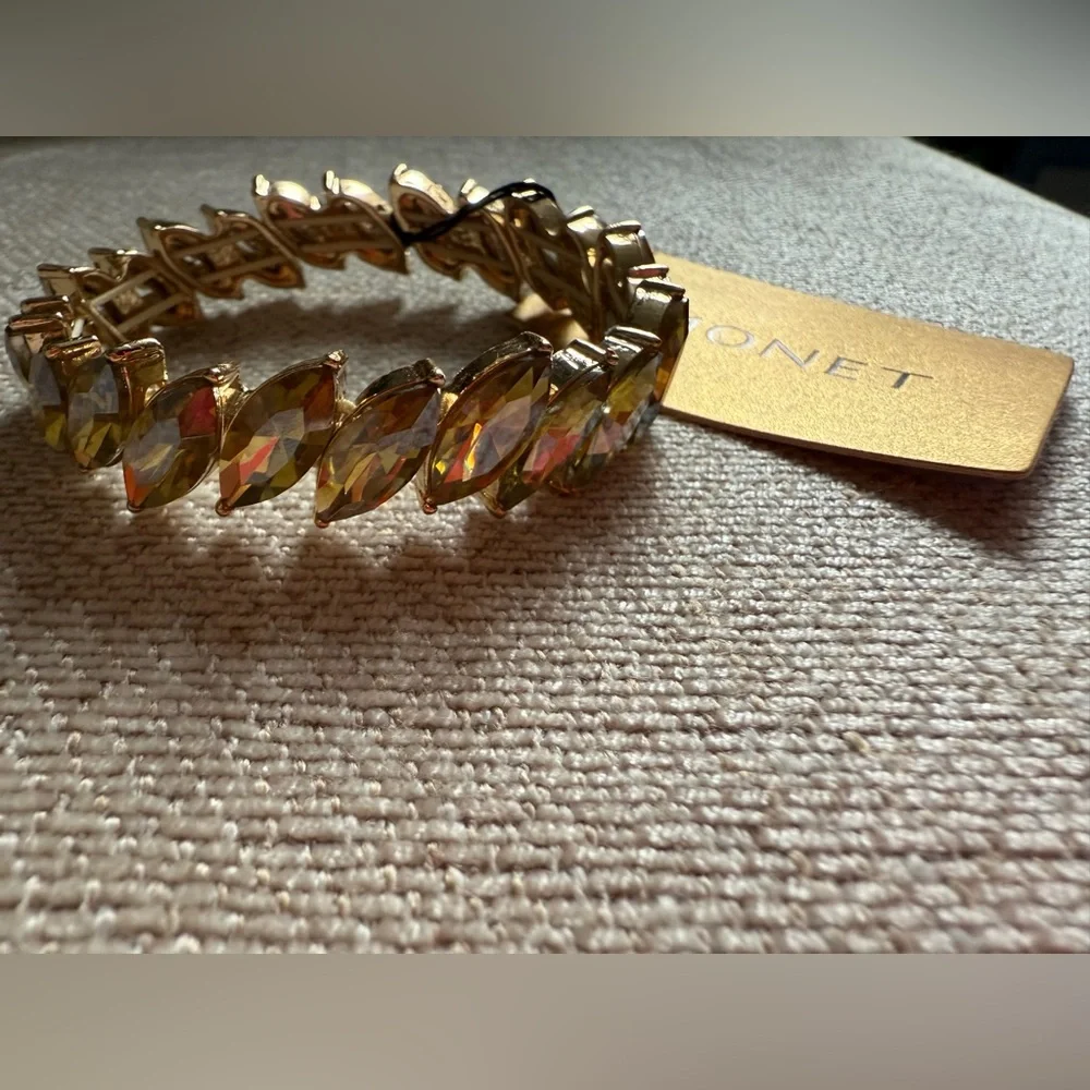 NWT gold-tone stretch bracelet with marquise-cut yellow crystals by Monet.